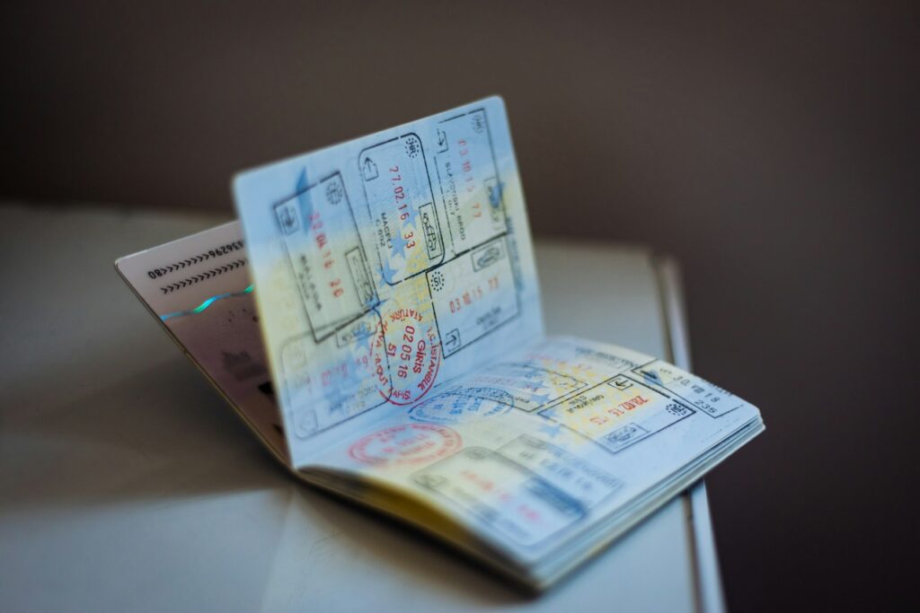 盖满签证章的护照 Passport with entry stamps